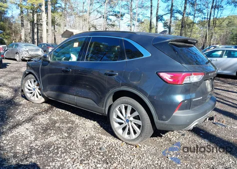 2022 Ford Escape Titanium z USA, uszkodzony, nr VIN 1FMCU9J95NUA09758